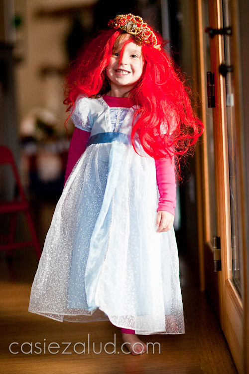 two and half year old girl dressed as Princess Ariel for Halloween