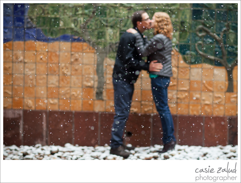 Engagement session in the snow outside the Boulder library