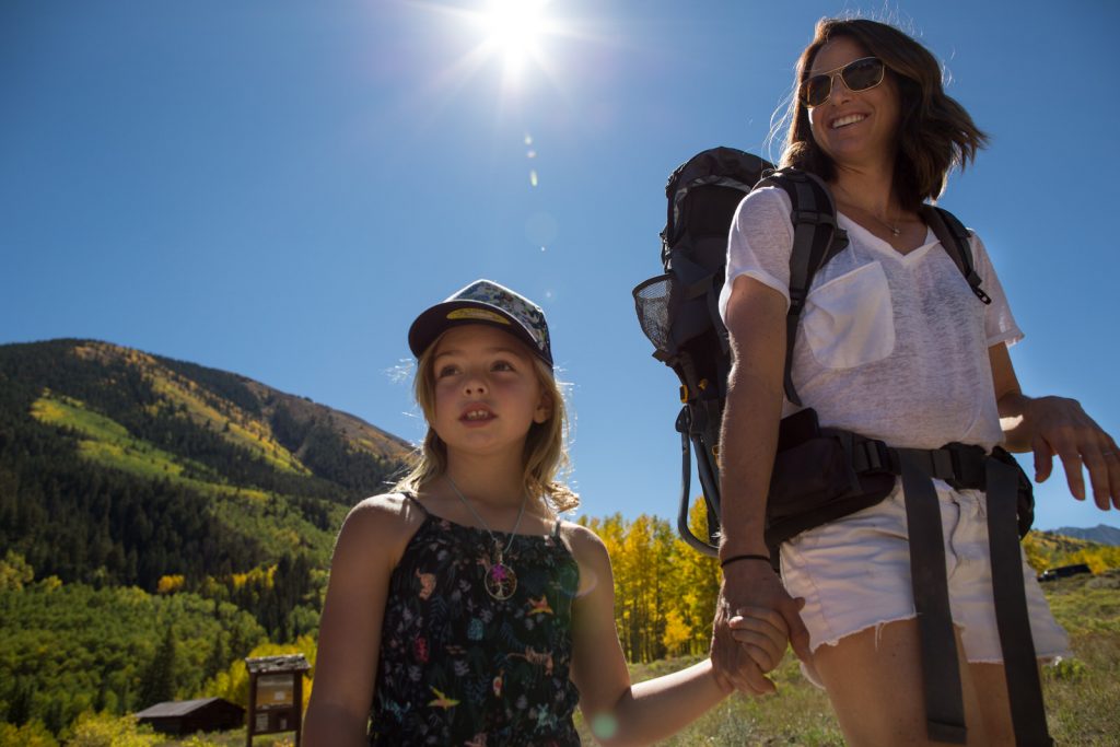 mother and daughter hiking in the fall in Ashcroft Colorado